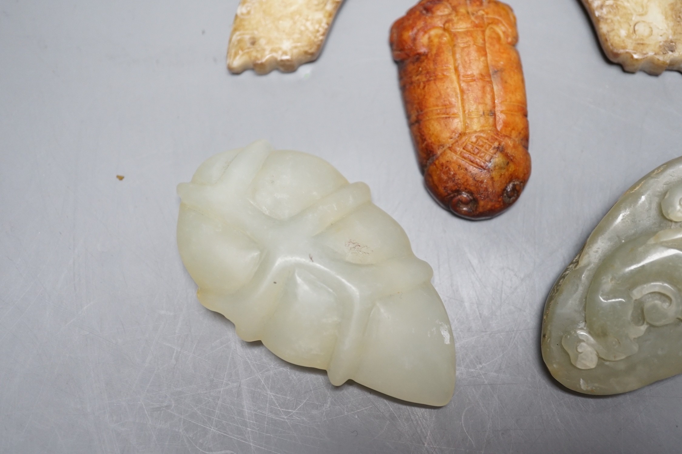 Four Chinese jade carvings, largest 11cm